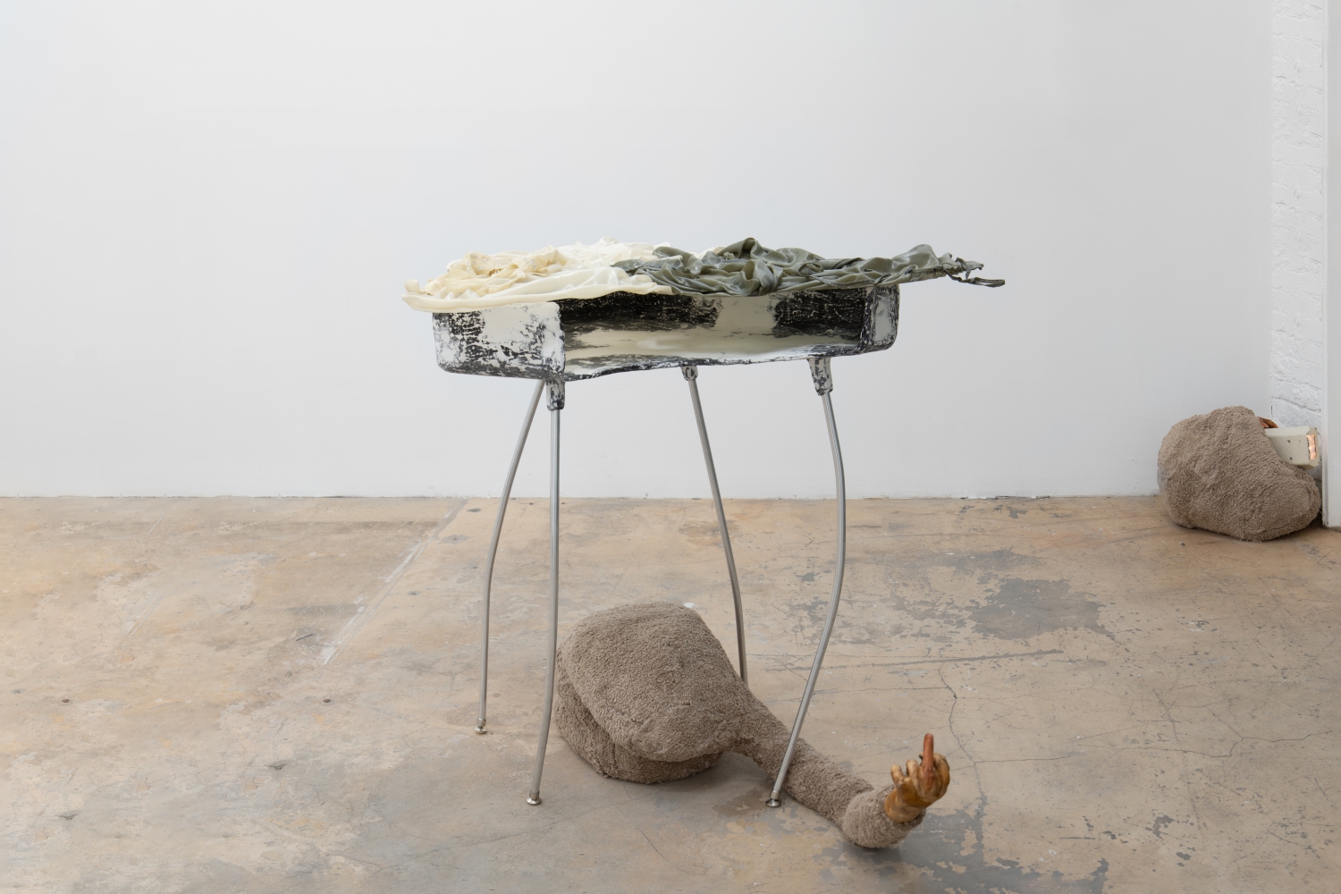 Catalina Ouyang
risk assessment (but, but what made me do the bad thing?), 2019
plaster, steel, burlap, pigment, carpet, symbiotic colonies of bacteria and yeast, garments, epoxy resin, enamel paint, aluminum, chair glides, abandoned security camera, mothballs, lightbulb
dimensions variable
CO003
